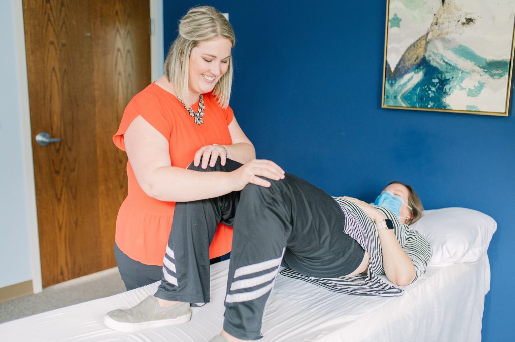 Physical therapist working on a patient's strength