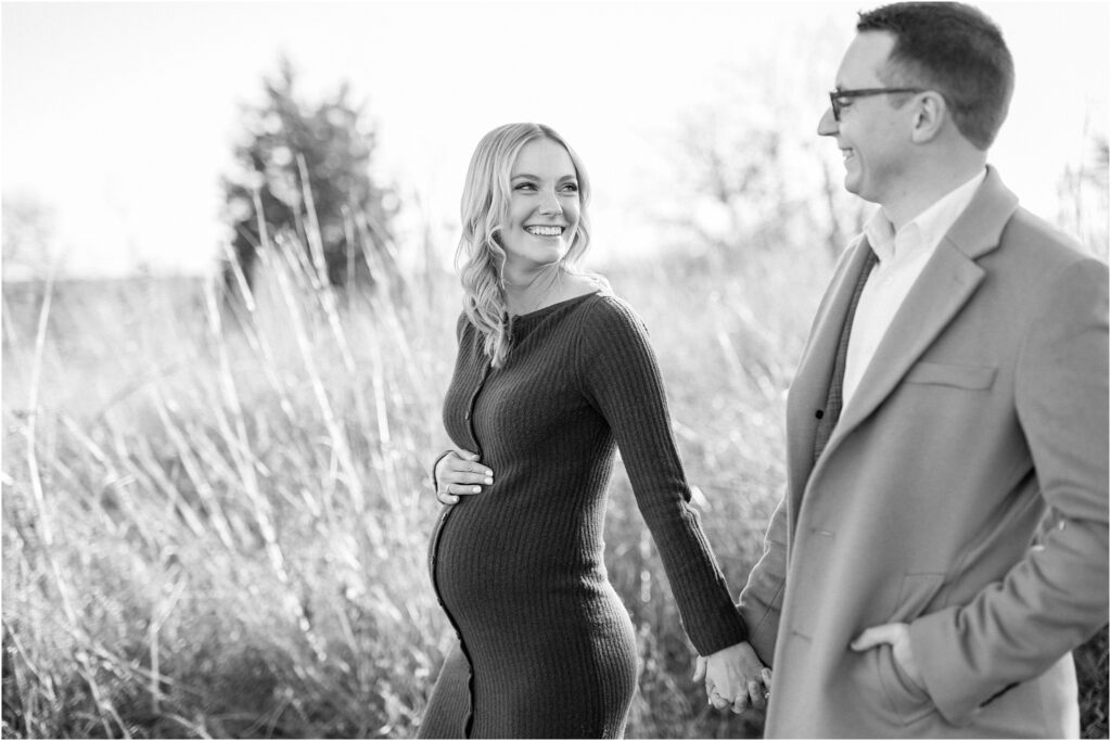 Black and white image of expecting parents at winter maternity session