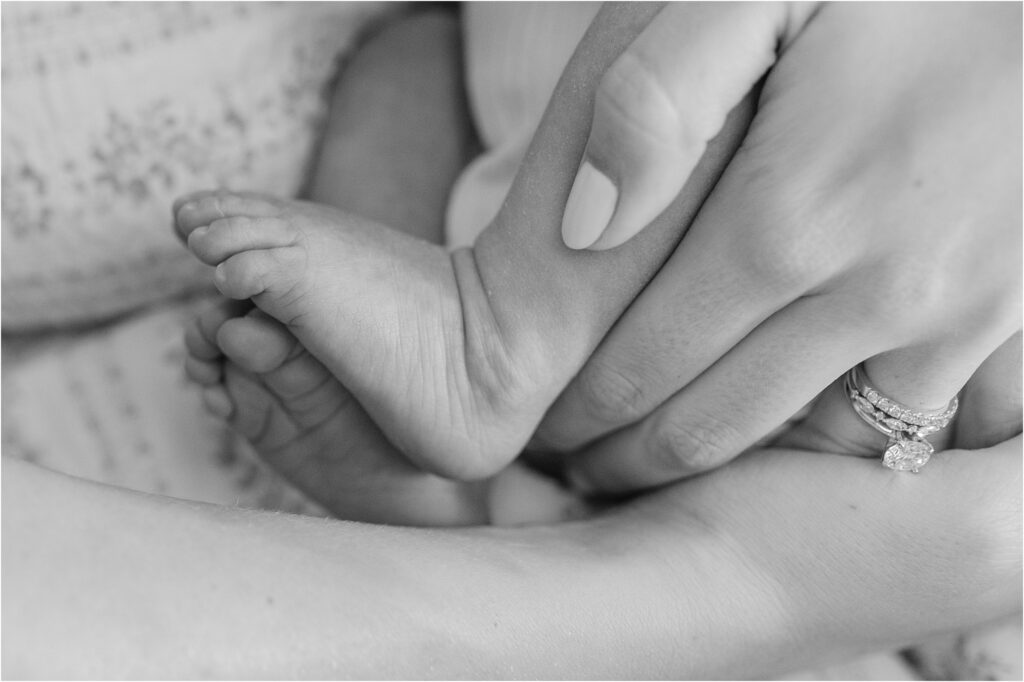Detail shot of baby toes in black and white taken in Milwaukee area by Abby Park Photography